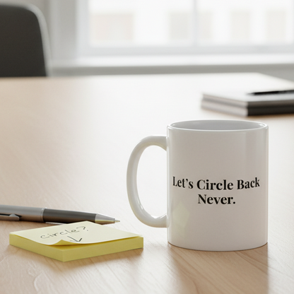White mug with 'Let's Circle Back Never' text on a desk with a pen and sticky notes.
